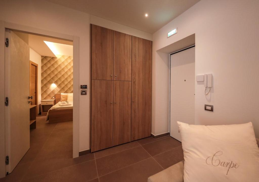 Posteľ alebo postele v izbe v ubytovaní Carpe Diem Rooms