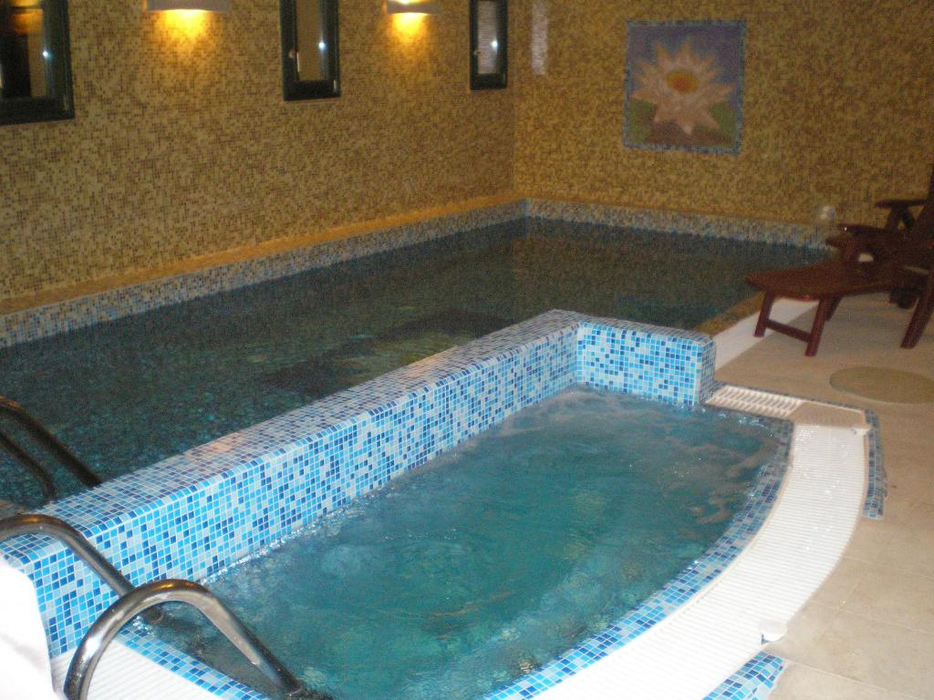 Bazén v ubytování Casa Ninfea Panzió nebo v jeho okolí