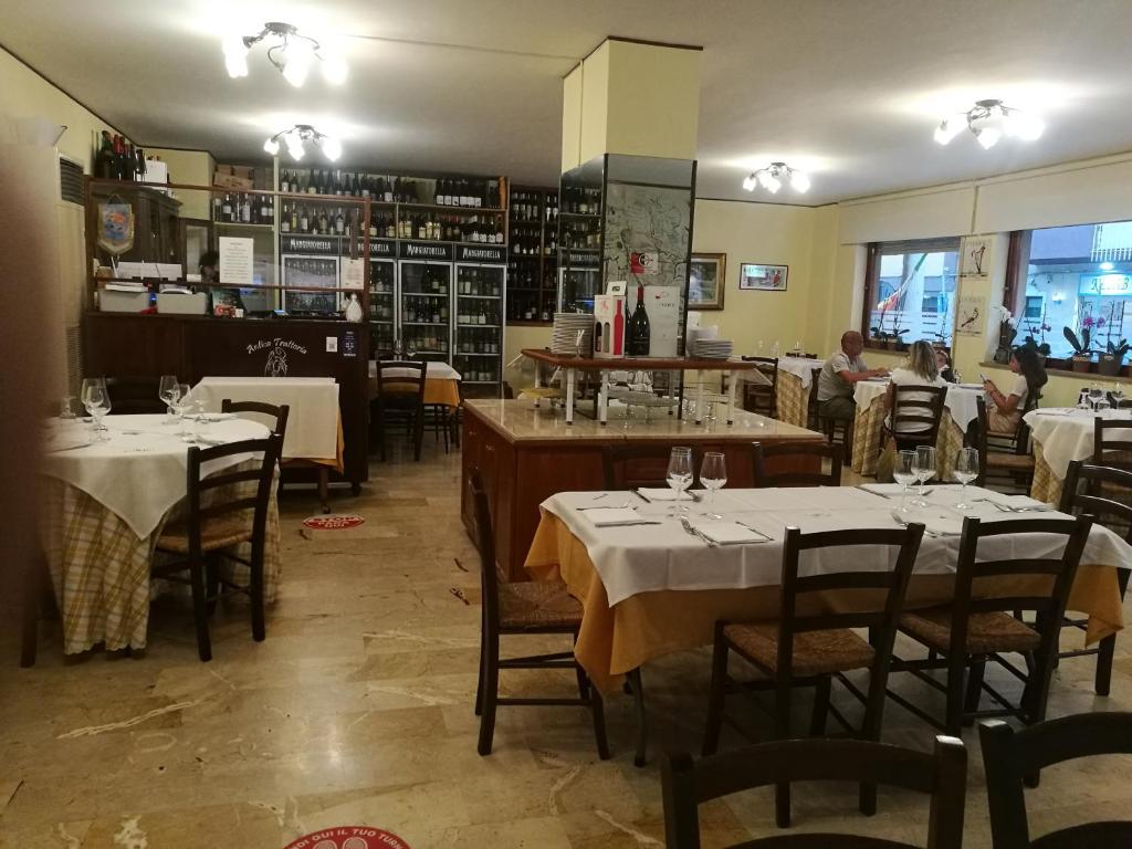 Reštaurácia alebo iné gastronomické zariadenie v ubytovaní Casa Mia, vacanze