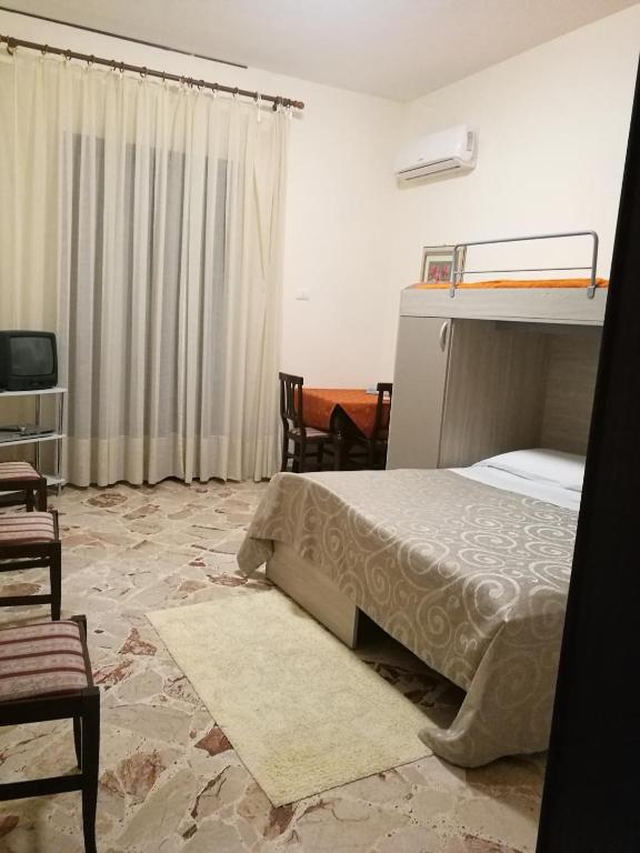 Posteľ alebo postele v izbe v ubytovaní Casa Mia, vacanze
