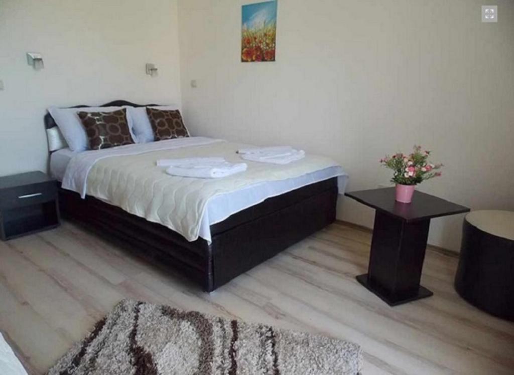 Postel nebo postele na pokoji v ubytování Guesthouse Vila DND