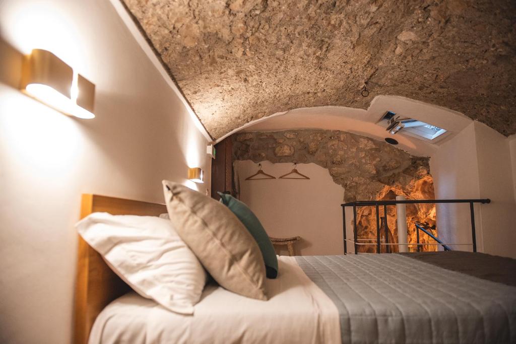 Posteľ alebo postele v izbe v ubytovaní Aurora Medieval House