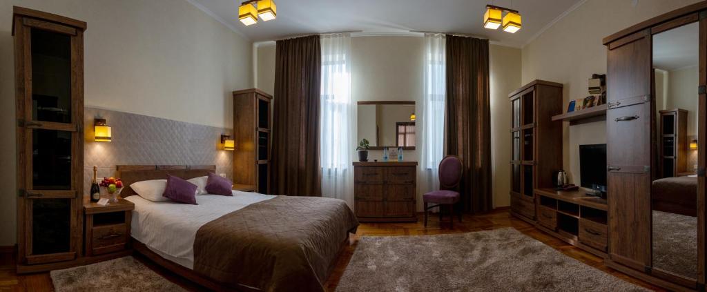 Postel nebo postele na pokoji v ubytování Hotel Star