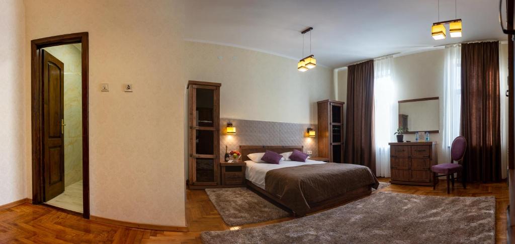 Postel nebo postele na pokoji v ubytování Hotel Star