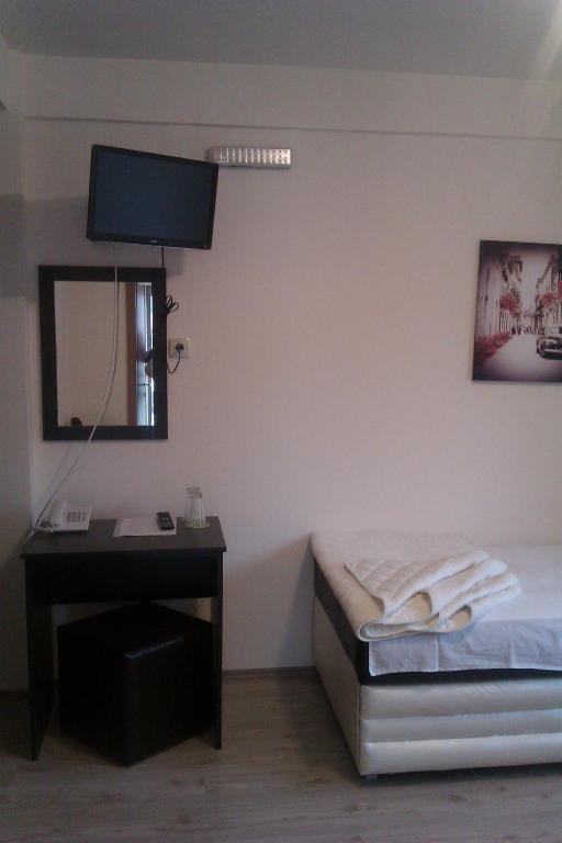 Postel nebo postele na pokoji v ubytování Guesthouse Vila DND
