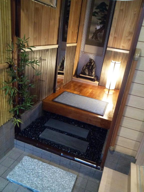 Postel nebo postele na pokoji v ubytování Kyoto Villa Kotone