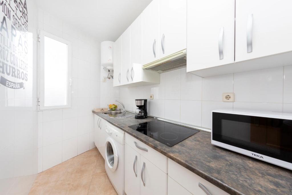 A kitchen or kitchenette at Boutique Apartments in the Heart of Madrid