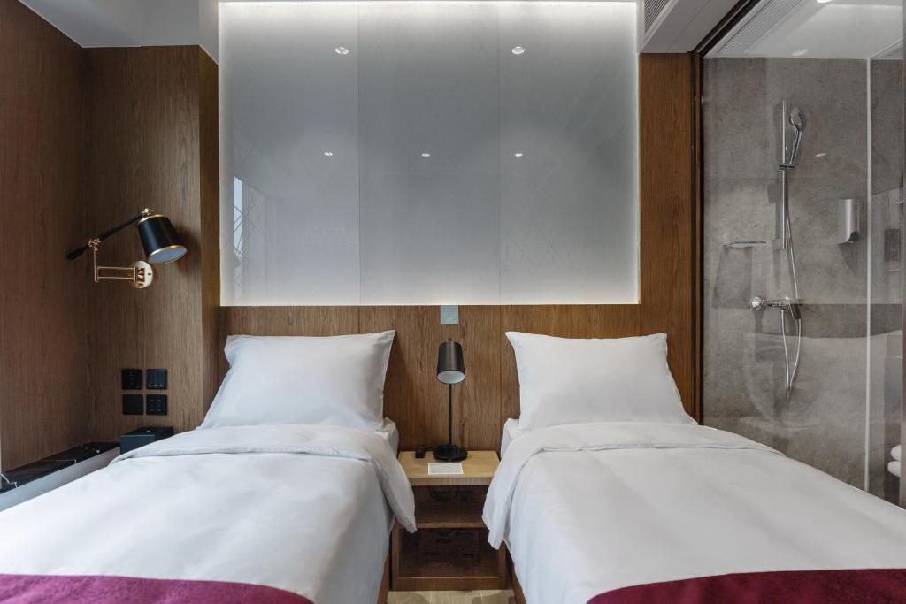 Letto o letti in una camera di The OTTO Hotel
