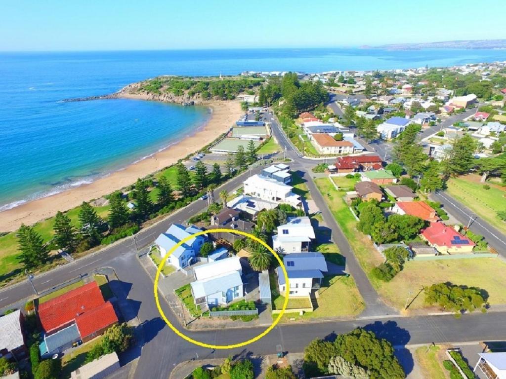 an aerial view of a suburb with a yellow circle at Port Elliot Beachcomber on Horseshoe Bay linen included spotless in Port Elliot