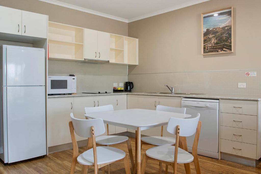 Kuchyň nebo kuchyňský kout v ubytování Sea Foam Villas