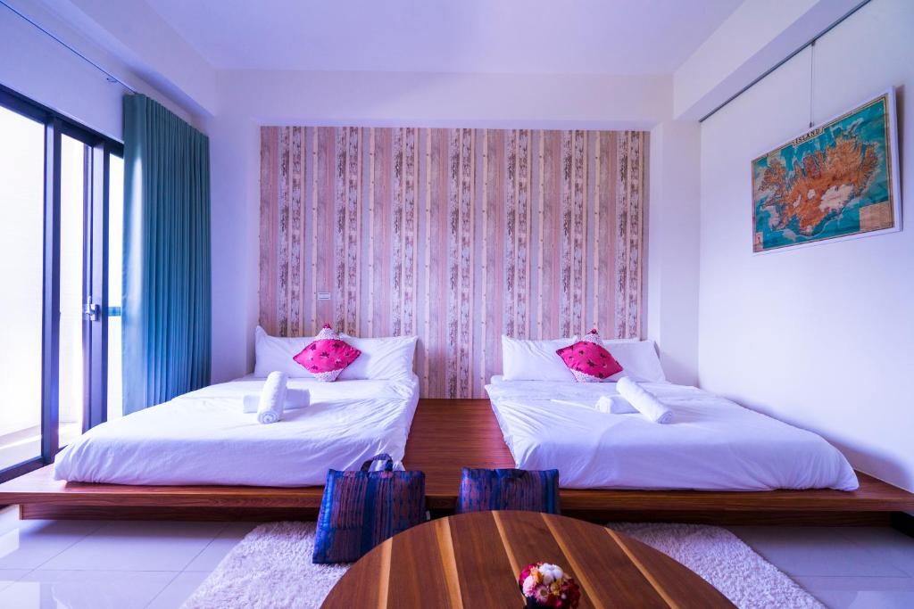 黑琵軼棧湖濱旅宿 K&B Happy Hostel房間的床