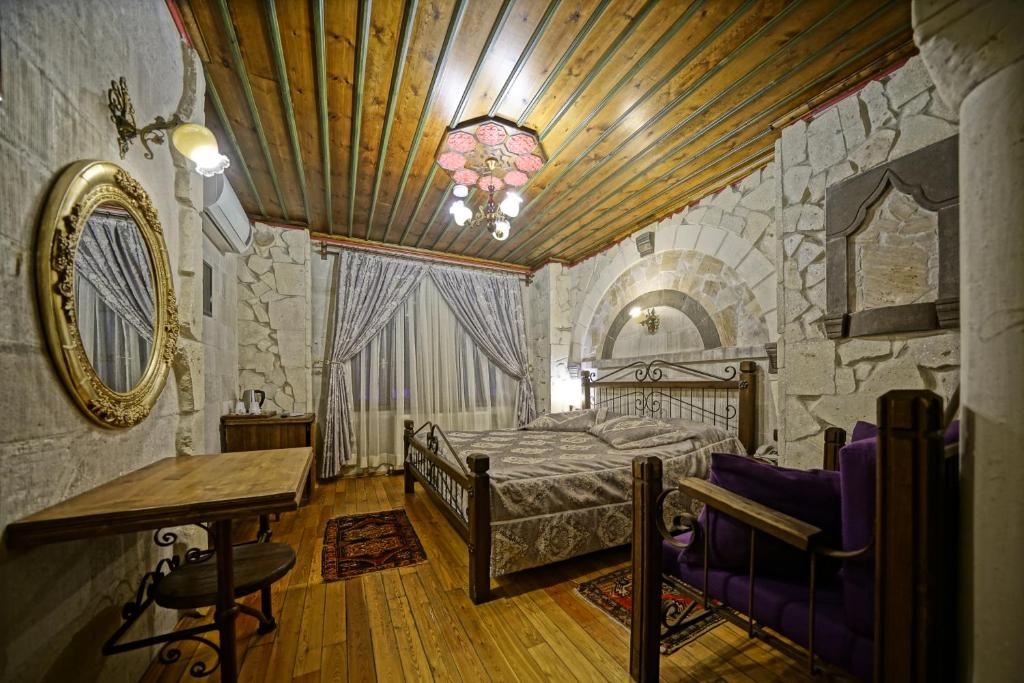 Postel nebo postele na pokoji v ubytování Alaturca House