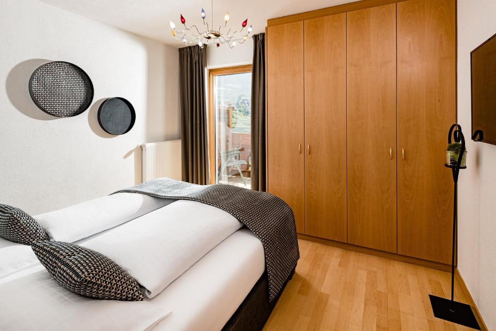 Postel nebo postele na pokoji v ubytování Hotel Brunnhofer