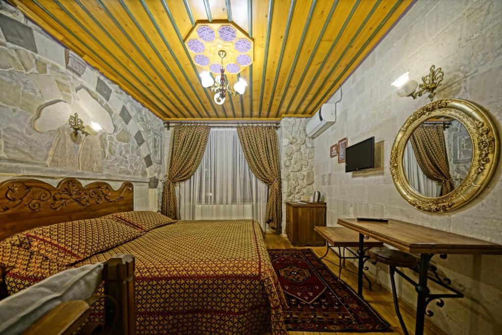 TV a/nebo společenská místnost v ubytování Alaturca House