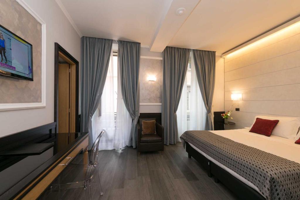 Postel nebo postele na pokoji v ubytování Duca d'Alba Hotel - Chateaux & Hotels Collection