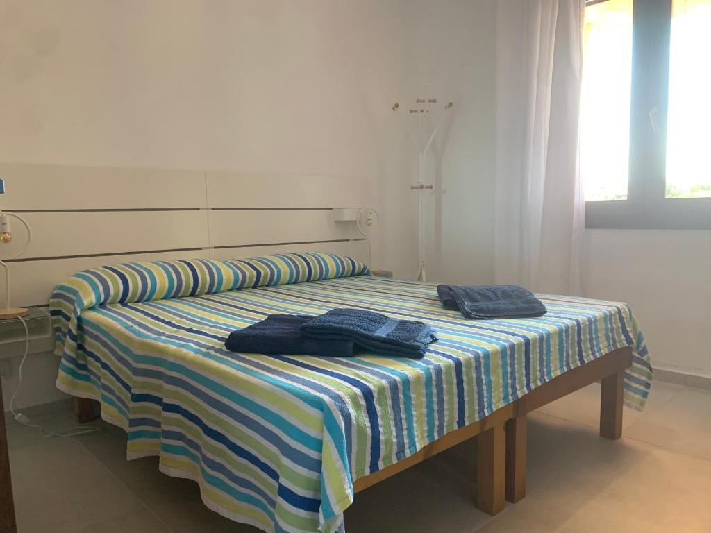 A bed or beds in a room at Bona Ciurrata