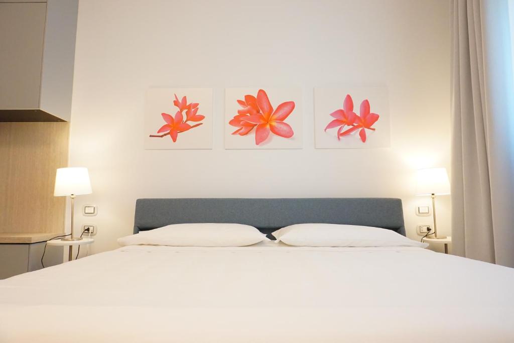 Łóżko lub łóżka w pokoju w obiekcie Delta Hotel Apartments