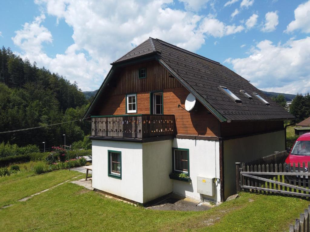 a small house with a brown roof at Ferienhaus Oma Hase in Mürzzuschlag