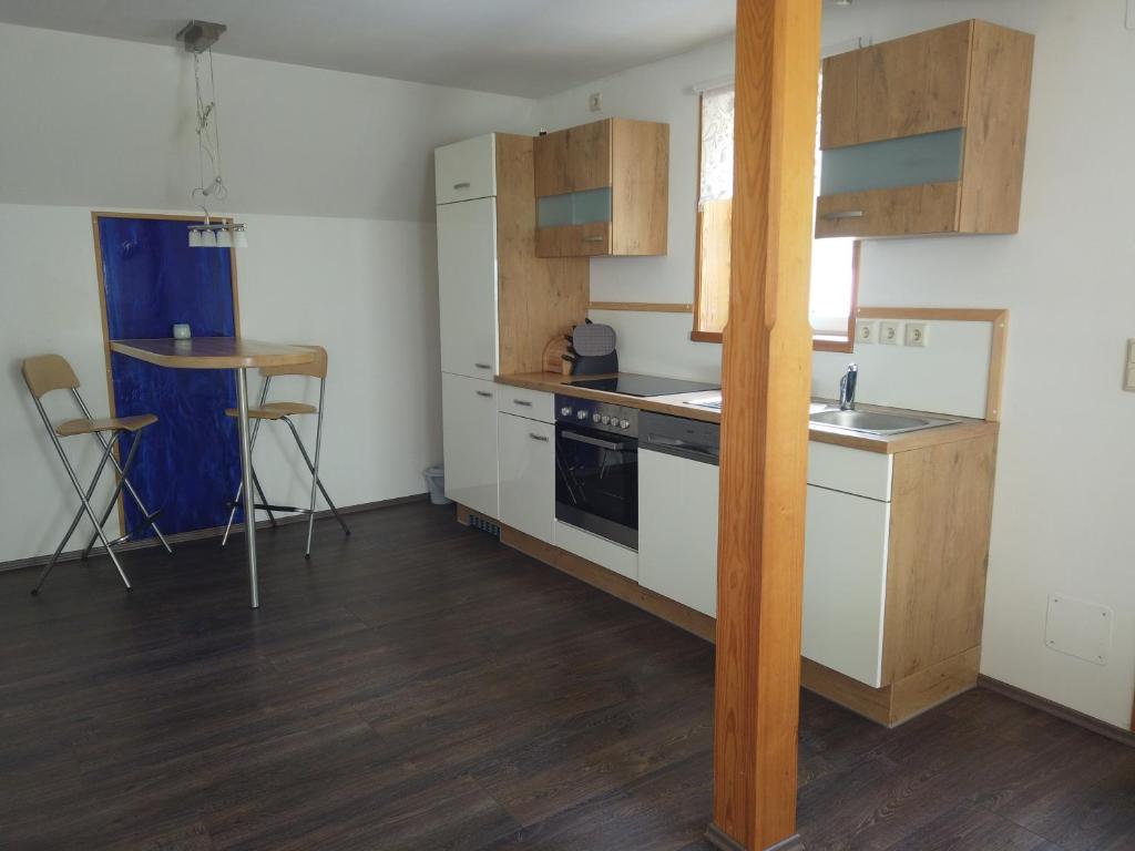 Kuchyň nebo kuchyňský kout v ubytování Ferienhaus Oma Hase