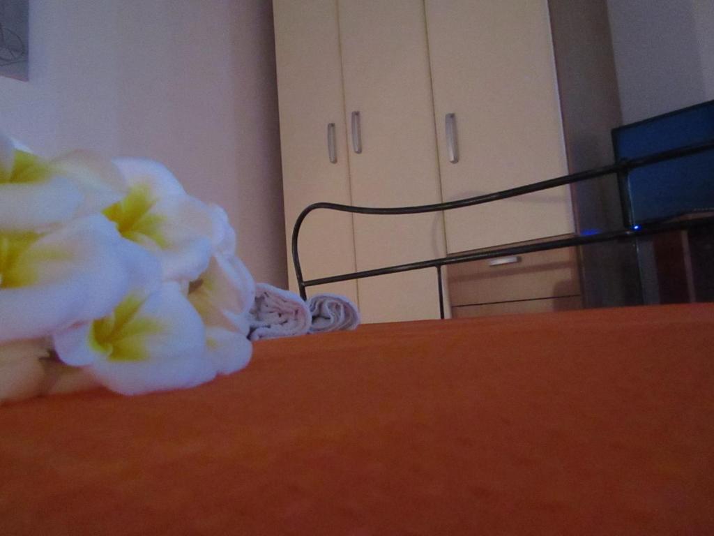 Łóżko lub łóżka w pokoju w obiekcie Casa Vacanze Barone di Civico 24