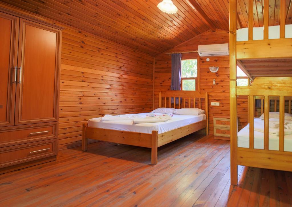 Postel nebo postele na pokoji v ubytování Duran Bungalow