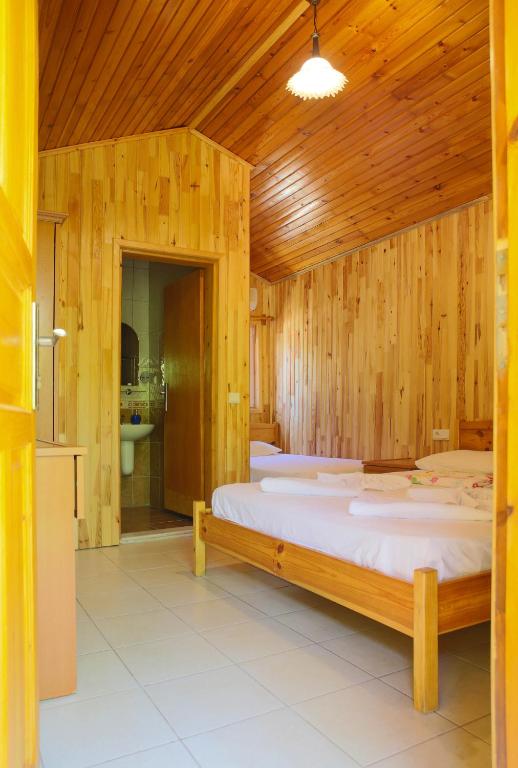 Postel nebo postele na pokoji v ubytování Duran Bungalow
