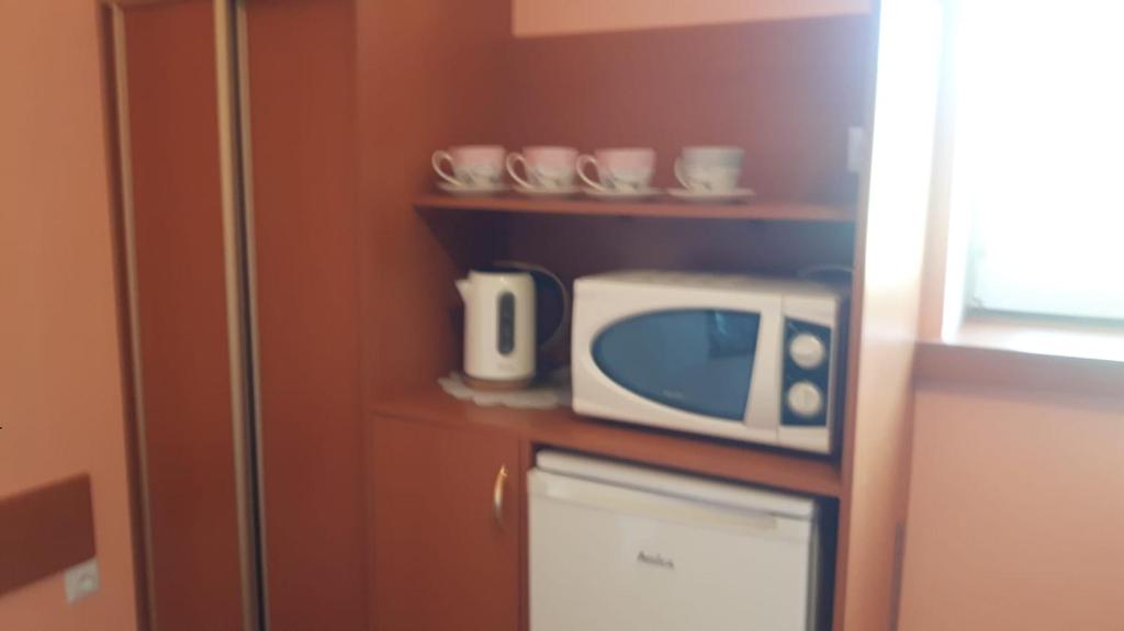 Kuchyňa alebo kuchynka v ubytovaní Pokoje Gościnne Biura Turystycznego KRIS
