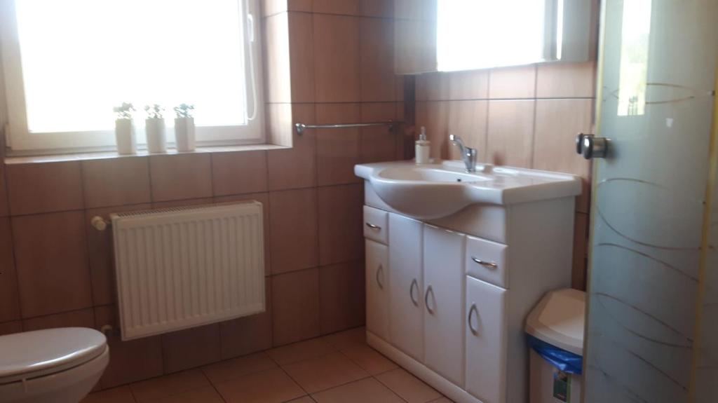 Kúpeľňa v ubytovaní Pokoje Gościnne Biura Turystycznego KRIS