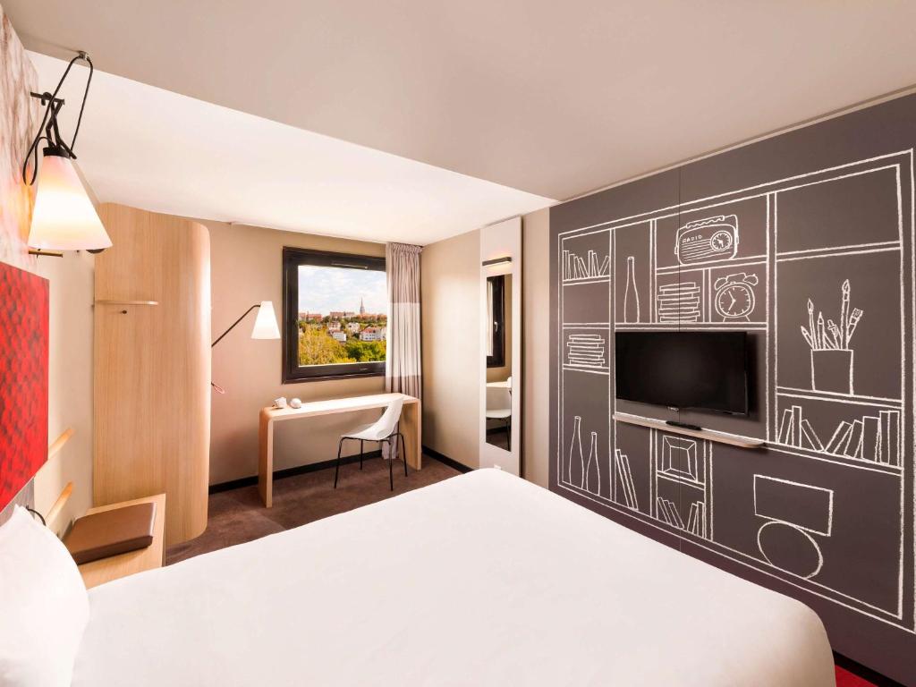 Televízia a/alebo spoločenská miestnosť v ubytovaní ibis Budapest Castle Hill