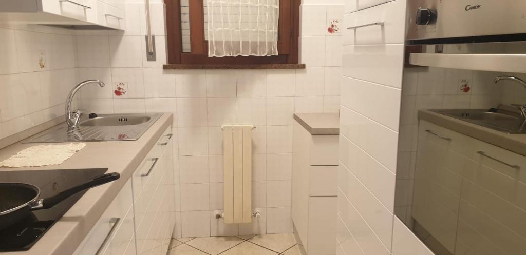 Kuchyňa alebo kuchynka v ubytovaní Casa Mimi'