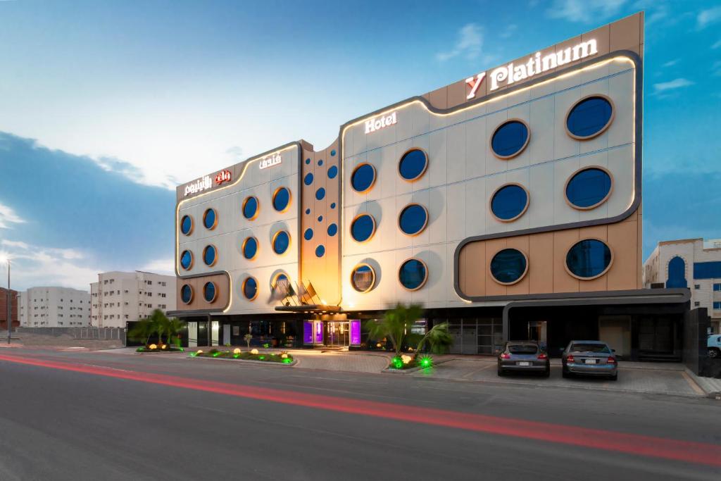 a building with a bunch of windows on the side of a street at Y Platinum Hotel in Al Madinah