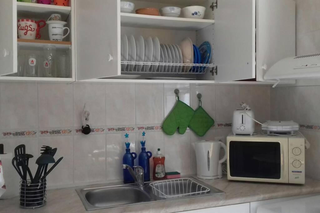 Kuchyň nebo kuchyňský kout v ubytování Yria Suite Zakynthos