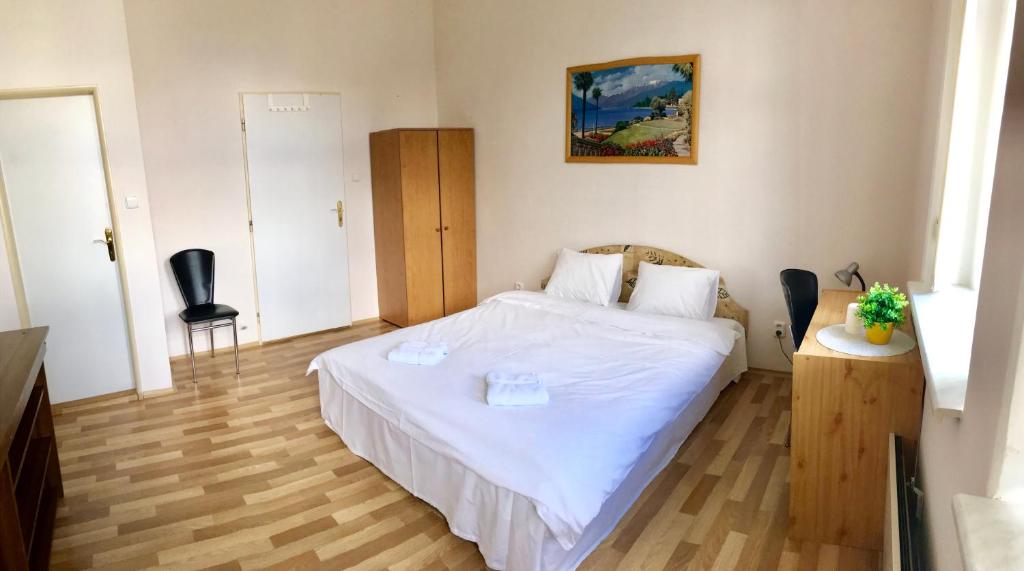Postel nebo postele na pokoji v ubytování Pension Májovka