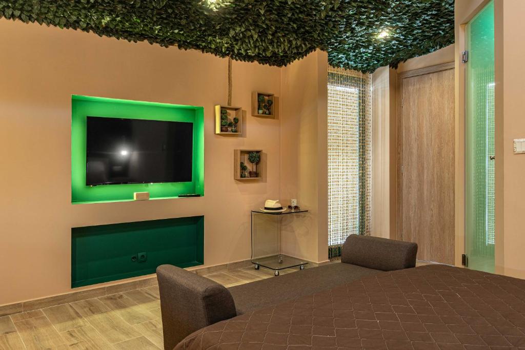 Televízia a/alebo spoločenská miestnosť v ubytovaní Cool Style Private Apartments