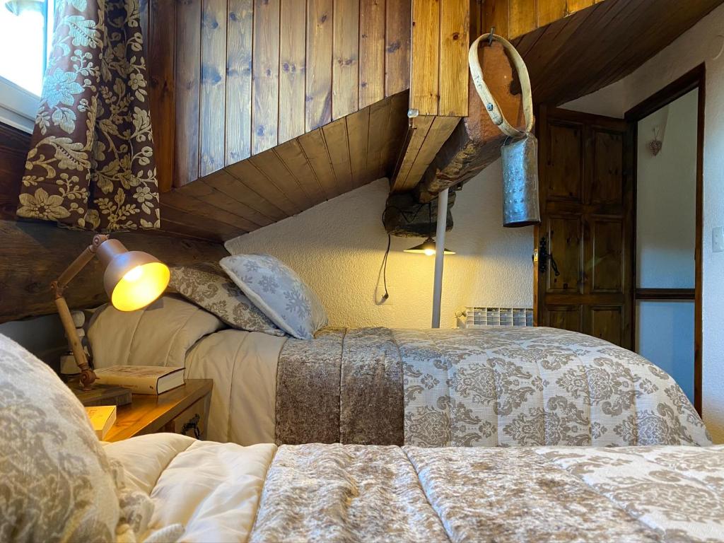 Postel nebo postele na pokoji v ubytování Apartamento Dúplex Llivia