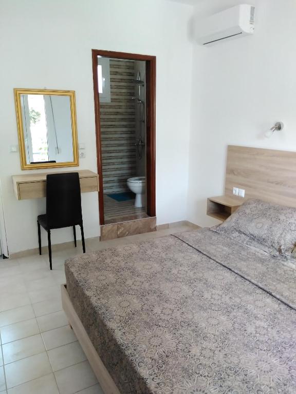 Łóżko lub łóżka w pokoju w obiekcie Hotel Dimitra Sun