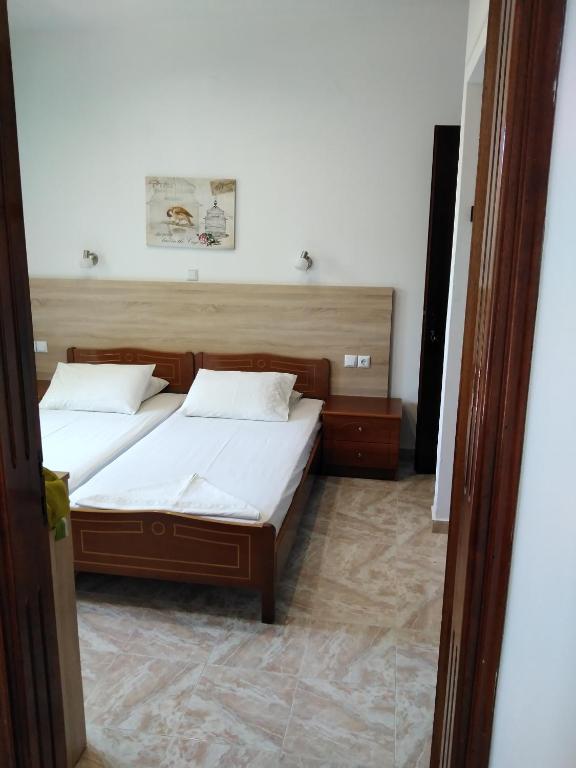 Łóżko lub łóżka w pokoju w obiekcie Hotel Dimitra Sun