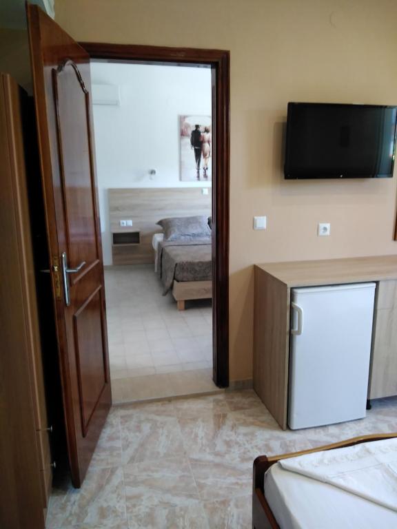 Łóżko lub łóżka w pokoju w obiekcie Hotel Dimitra Sun