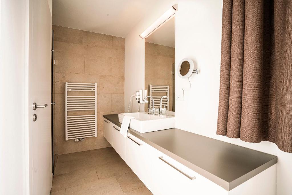 A bathroom at Tauernresidence Radstadt by ALPS RESORTS