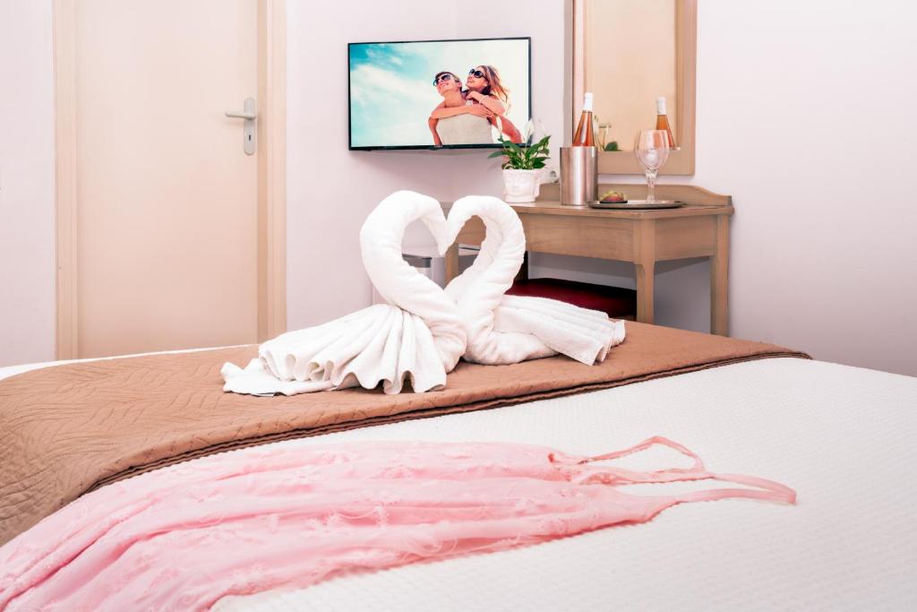 Postel nebo postele na pokoji v ubytování Hotel Brascos