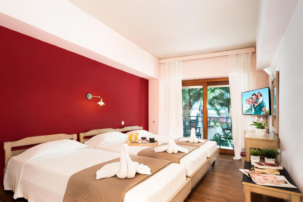 Postel nebo postele na pokoji v ubytování Hotel Brascos