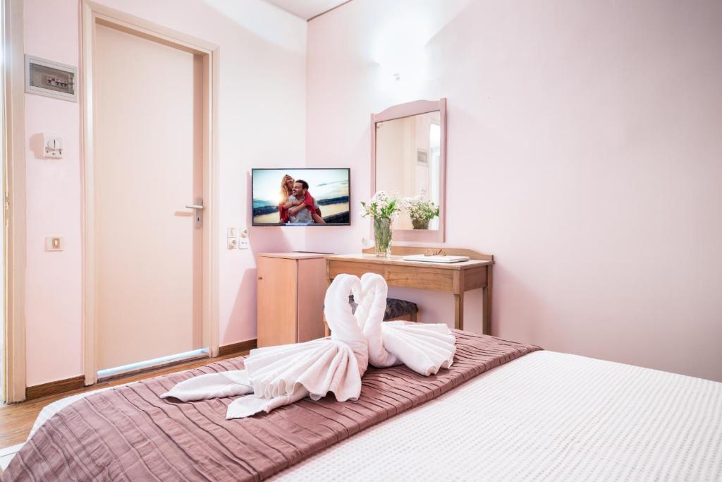 Postel nebo postele na pokoji v ubytování Hotel Brascos