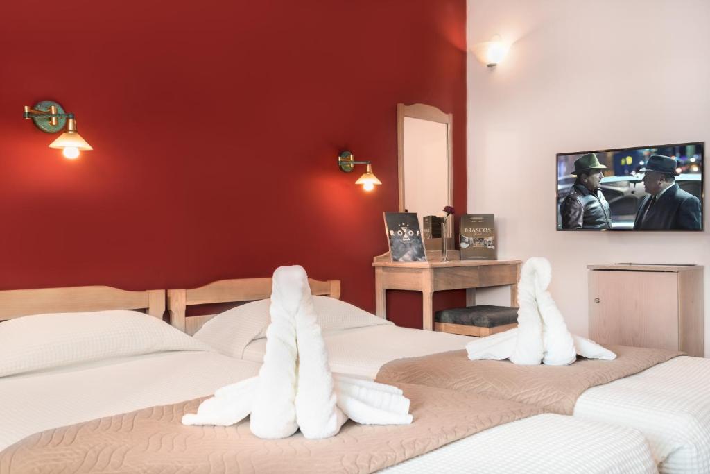 Postel nebo postele na pokoji v ubytování Hotel Brascos