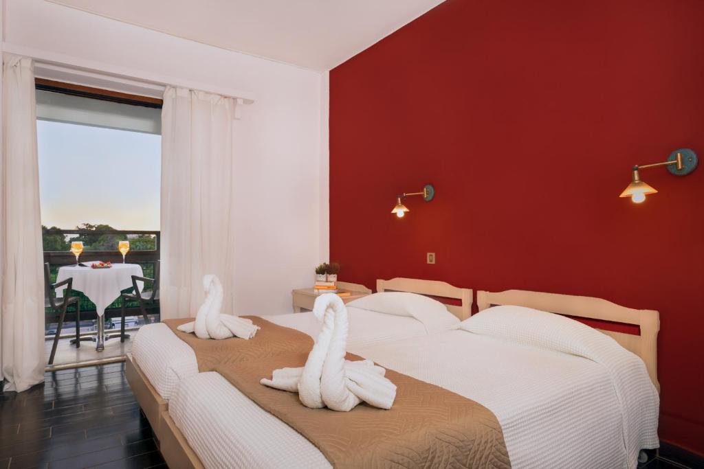 Postel nebo postele na pokoji v ubytování Hotel Brascos