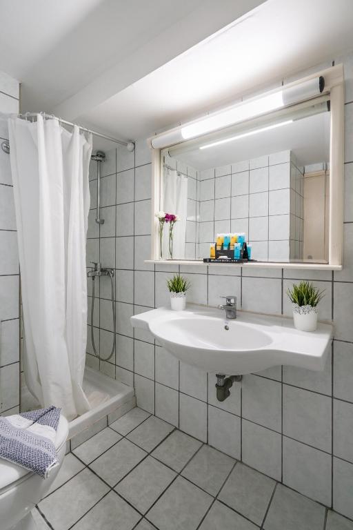Koupelna v ubytování Hotel Brascos