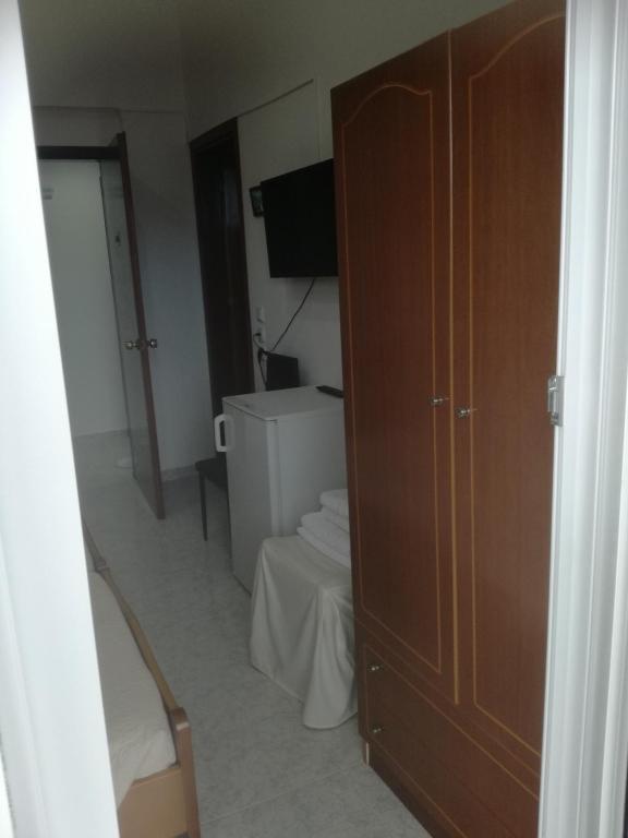 Łóżko lub łóżka w pokoju w obiekcie Hotel Dimitra Sun
