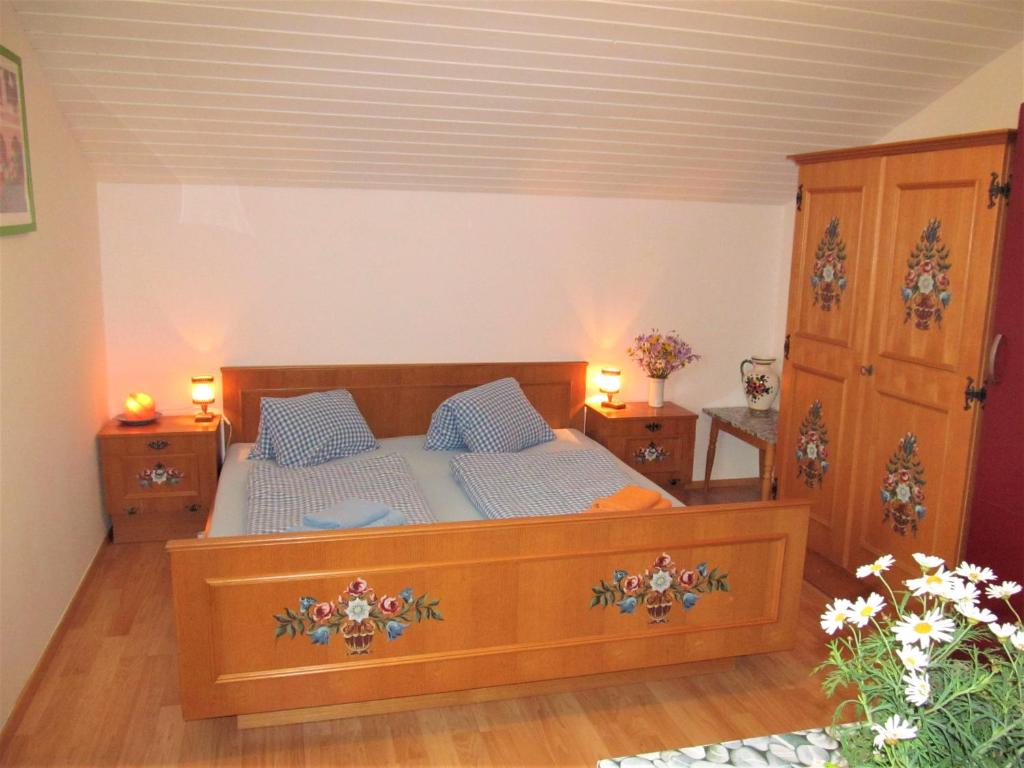 Postel nebo postele na pokoji v ubytování Gästehaus Horizont