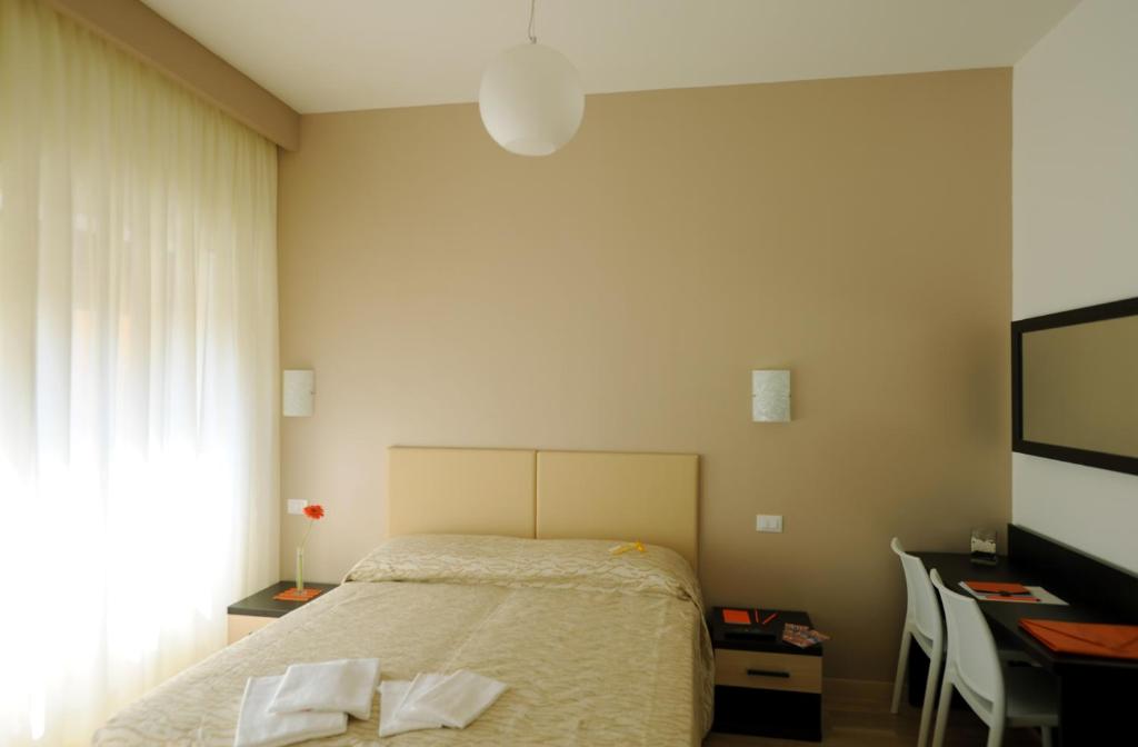 Posteľ alebo postele v izbe v ubytovaní Honey Rooms