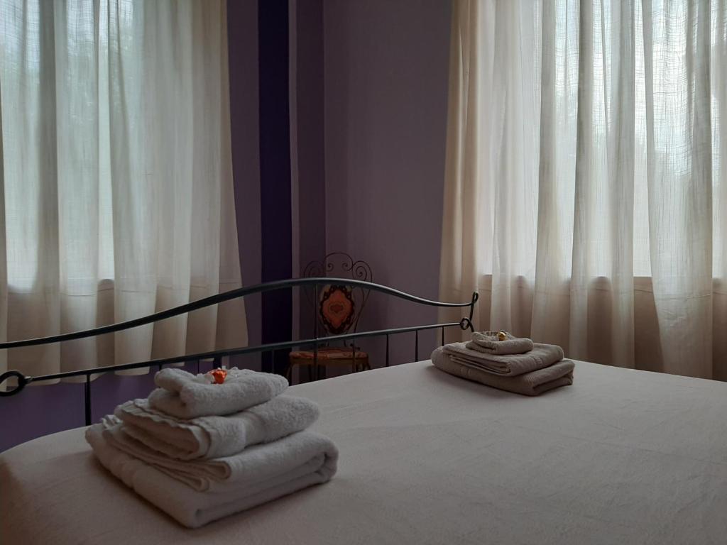 Postel nebo postele na pokoji v ubytování Torino in Colore