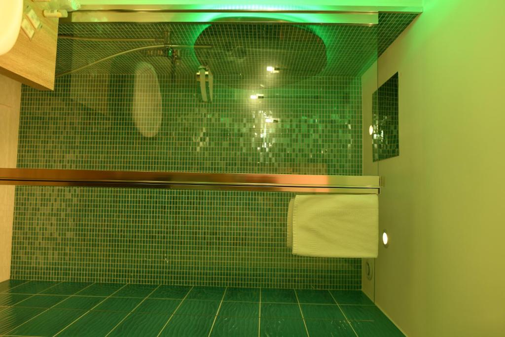 Koupelna v ubytování Hôtel Le Claridge